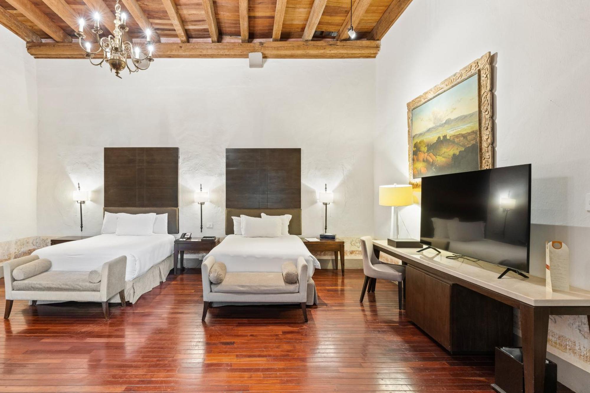 Quinta Real Puebla Hotel Kültér fotó A room at Hotel Casa 900